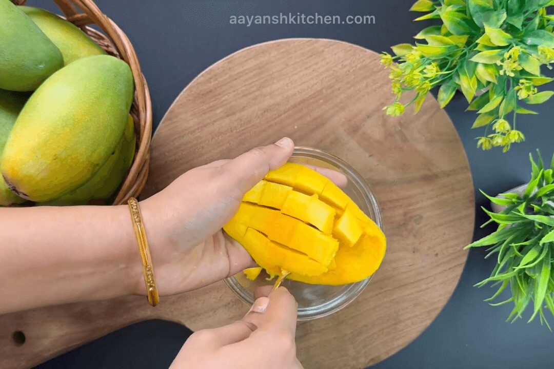 Scoop out pulp with spoon