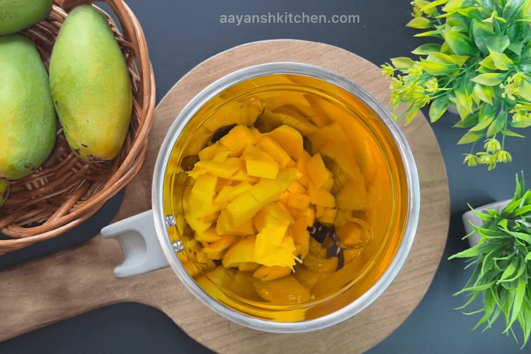 mango pulp in grinding  jar