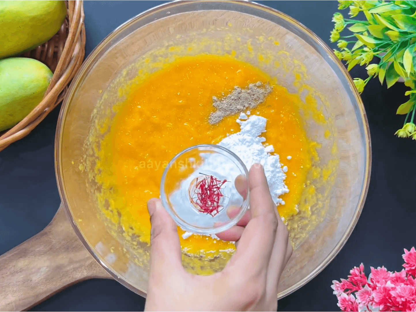 saffron strands added to the bowl