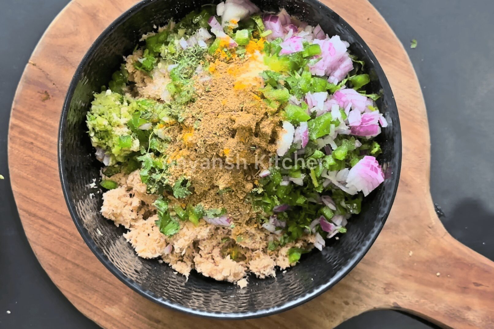 adding spices to the bowl