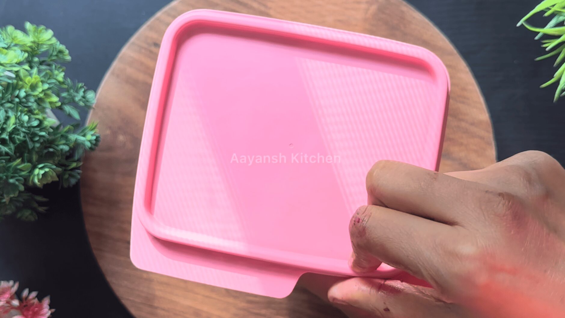 Airtight glass container filled with fresh purple jamun pulp
